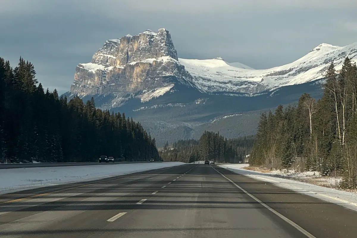 Winter highway in BC with snow-covered mountains